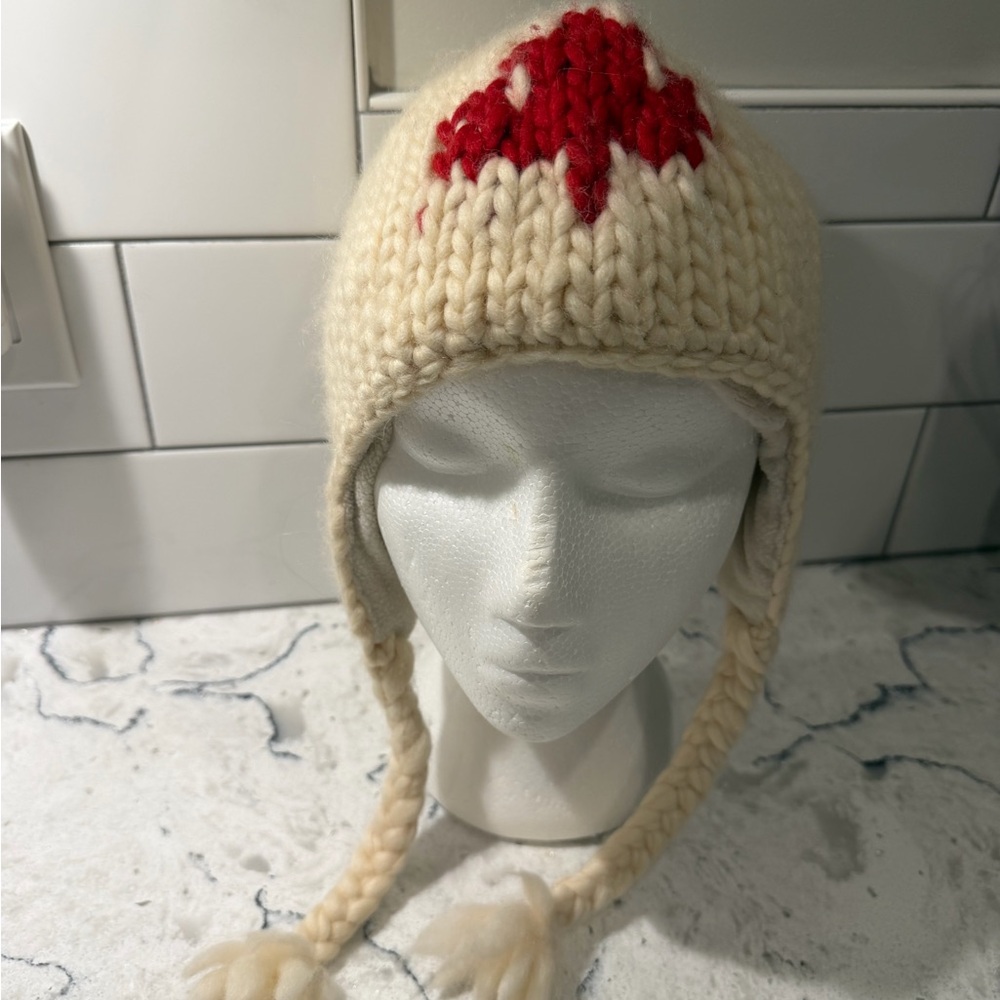 100 percent wool CANADA toque with earflaps &  tassels 
OS warm, attractive!